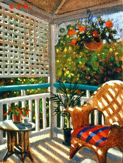 A cane chair sits on a Queensland verandah