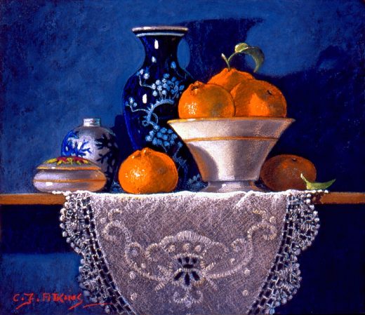 Mandarines on a shelf against a blue background.
