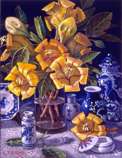 Several large yellow flowers accompany blue and white ceramics.