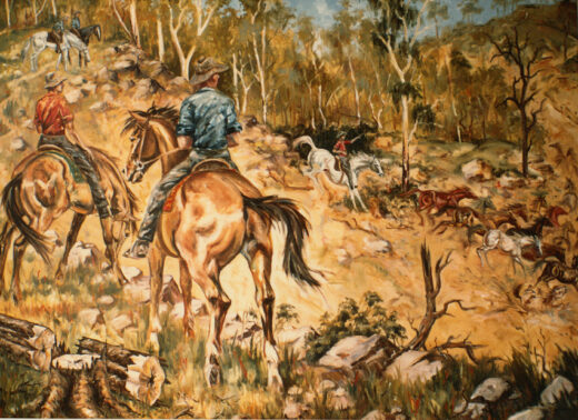 Five men on horseback follow a herd of wild horses.