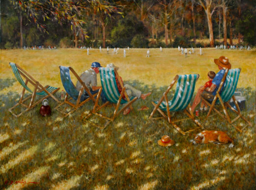 People in deckchairs watch a game of cricket.