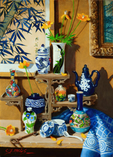 A painting of bamboo leaves is behind a collection of ceramics.