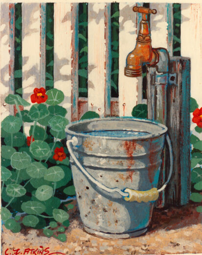 A galvanised bucket is under a tap.