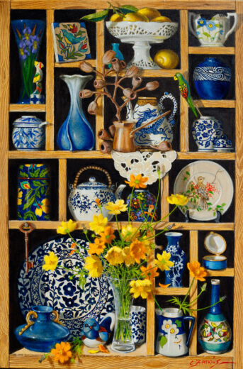 The small jug on the bottom shelf is decorated with prunus flowers after the manner of the Mak'Merry potters.