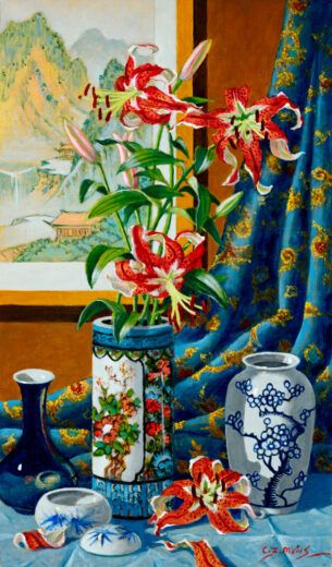 Beautiful bulbs have flowered as exotic red blooms. The vase of flowers is accompanied by other small ceramics and an oriental wall hanging.