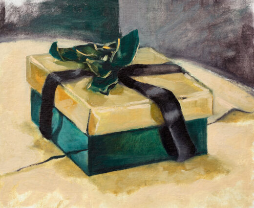 A box, probably containing a gift, is wrapped with a velvet bow.
