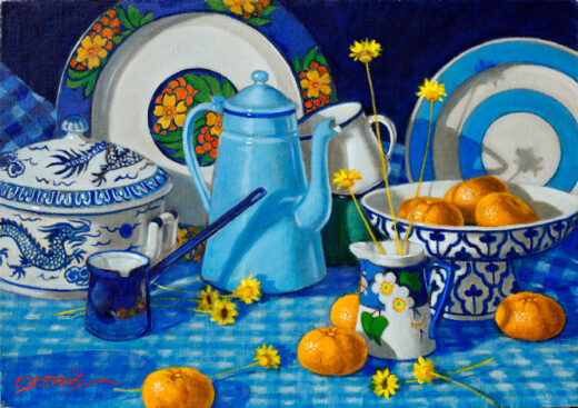 A ceramic pot with a dragon motif is set next to two plates, a coffee pot and seven pieces of brightly -coloured fruit.